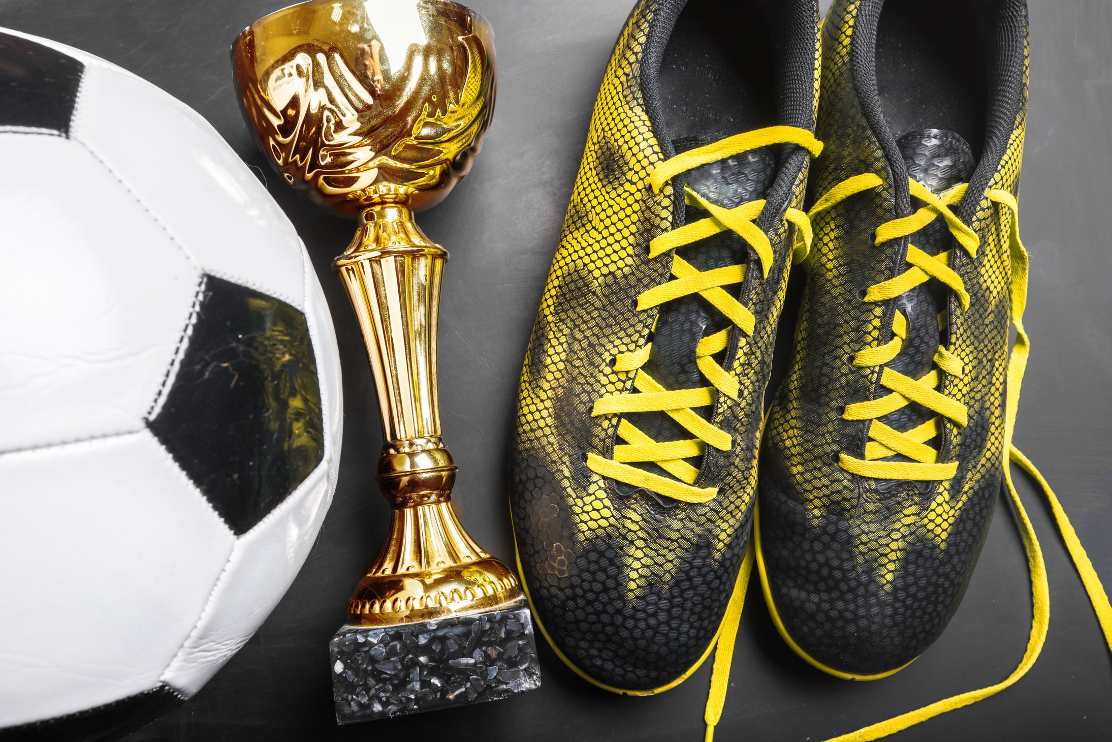 Trophy cup and soccer ball